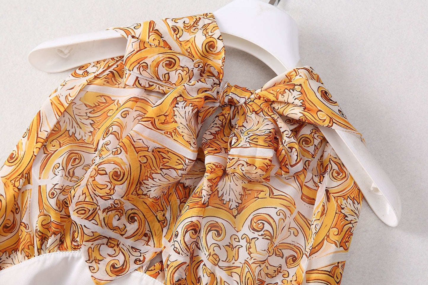 Yellow and white baroque pattern halter neck dress