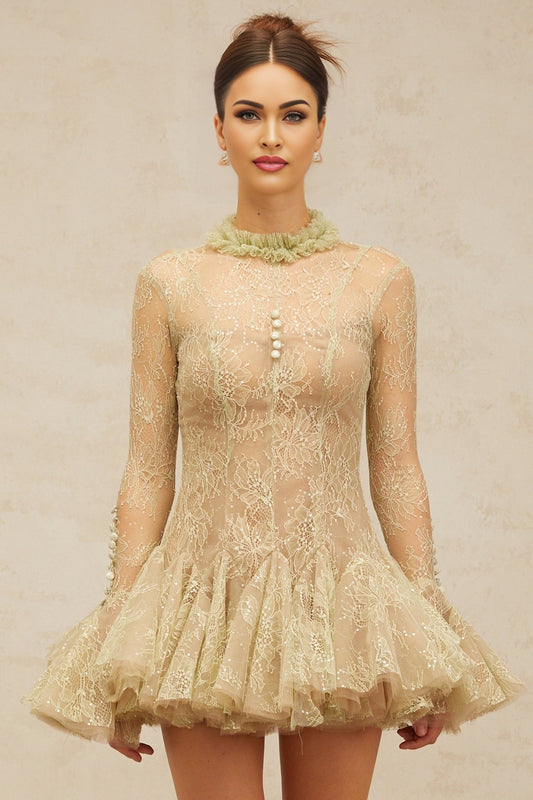 Young woman wearing a green mini dress with floral embroidery and flared skirt standing in a garden setting