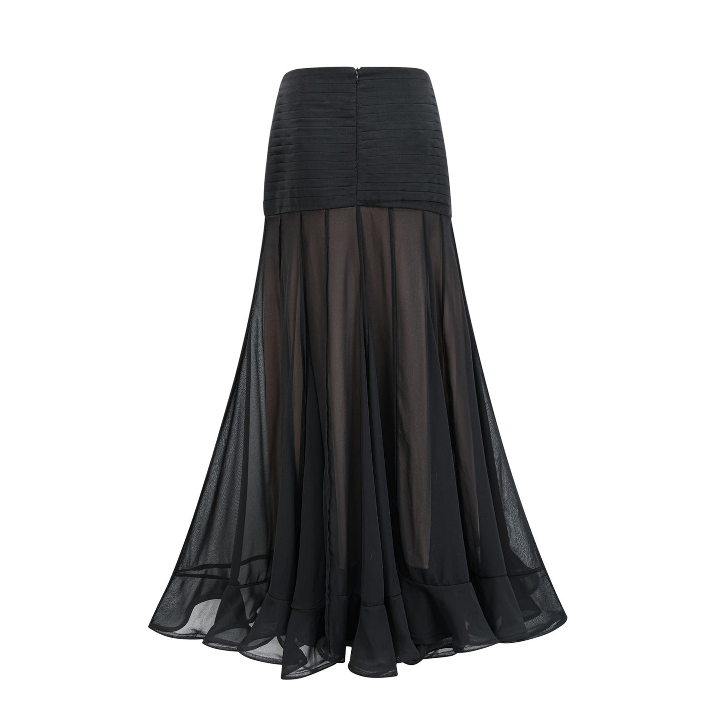 Young woman wearing a long flowy maxi skirt with ruffles and pleats in a soft fabric standing in a casual pose