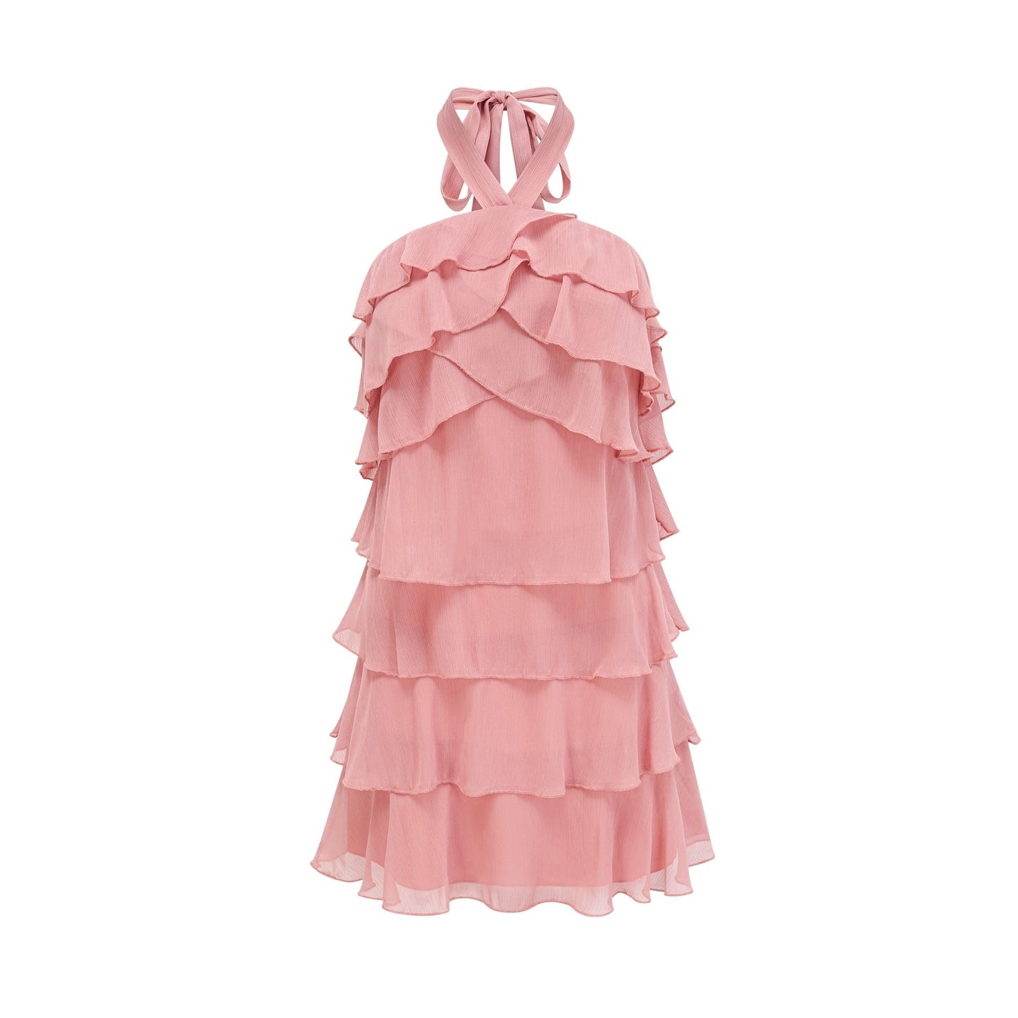 Young woman wearing a pink halterneck mini dress with tiered ruffles standing against a plain background