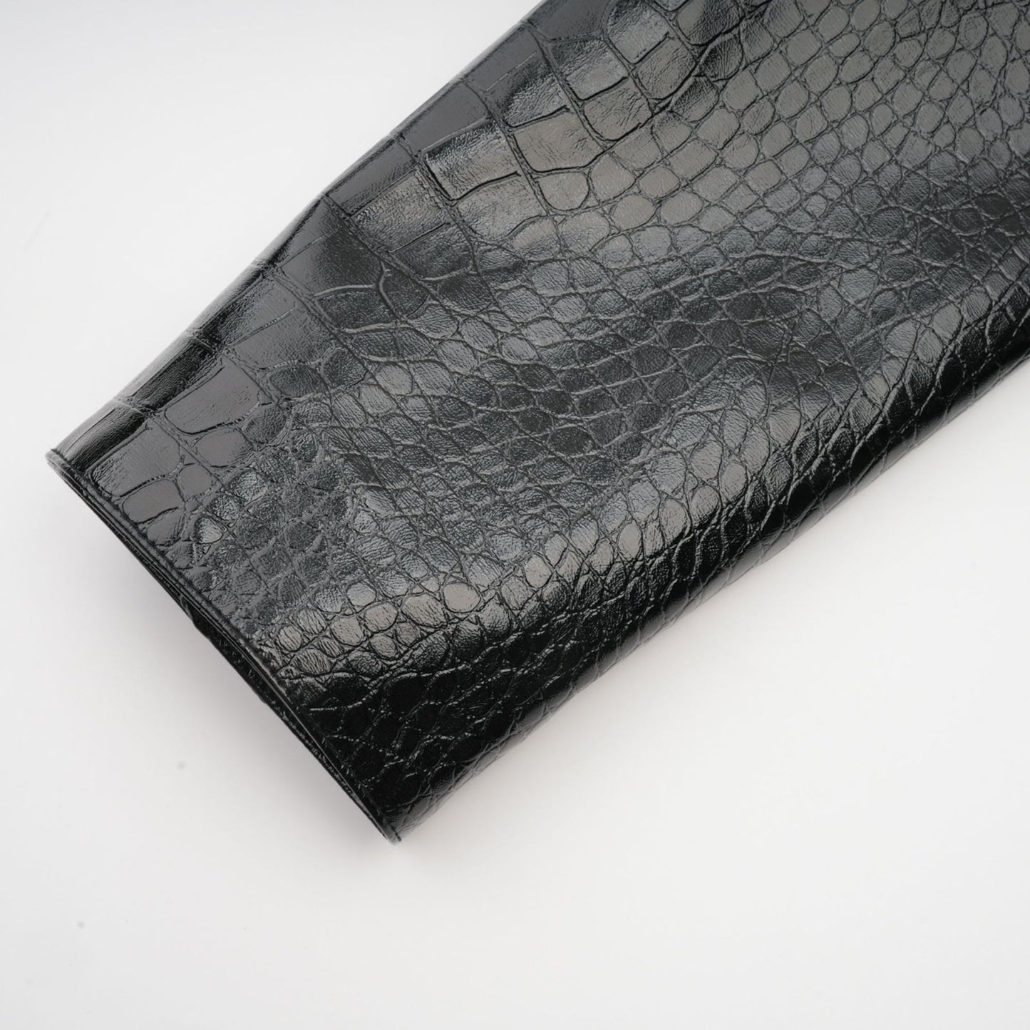 Young woman wearing black leather jacket with cinched waist and zippered front