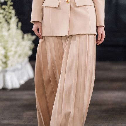 Pleated maxi skirt with a high-waisted fit, crafted from 90% polyester and 10% spandex, lined with 100% polyester for smooth comfort