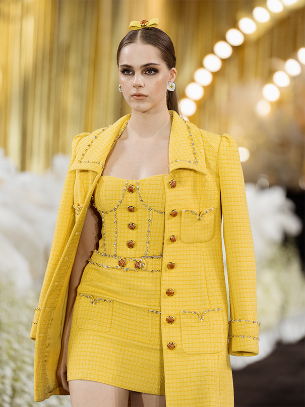 Sophia embellished tweed coat in vibrant yellow with crystal lapels, gemstone buttons, and a fitted mid-thigh silhouette, crafted from 100% polyester.