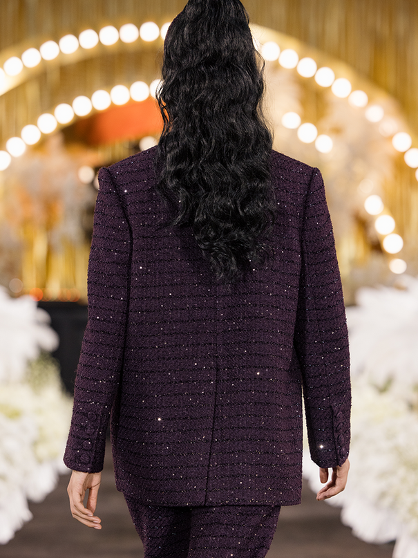 Sophia tweed wide-leg trousers with a high-waisted fit, wide-leg silhouette, and subtle tweed texture, crafted from a premium polyester-wool blend.