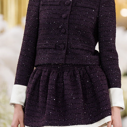 Classic cropped tweed jacket with contrasting collar and cuffs for a refined finish