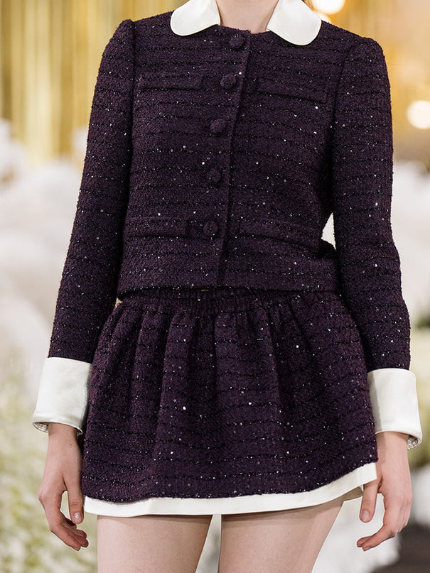 Classic cropped tweed jacket with contrasting collar and cuffs for a refined finish