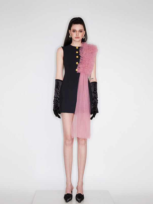 Sophia black dress with a classic A-line silhouette, gold button details, and dramatic pink tulle embellishment, crafted from polyester and nylon.