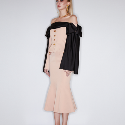 Corset-style top with off-shoulder draped detailing, decorative buttons, and tailored fit. Made from 90% polyester, 10% spandex, and lined with 100% polyester