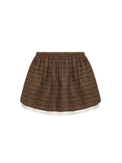 Sophia tweed skater skirt with elastic waistband, layered hem, and subtle sparkle, crafted from a blend of polyester, wool, and mulberry silk.