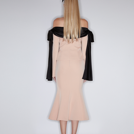 Corset-style top with off-shoulder draped detailing, decorative buttons, and tailored fit. Made from 90% polyester, 10% spandex, and lined with 100% polyester