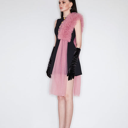 Sophia black dress with a classic A-line silhouette, gold button details, and dramatic pink tulle embellishment, crafted from polyester and nylon.