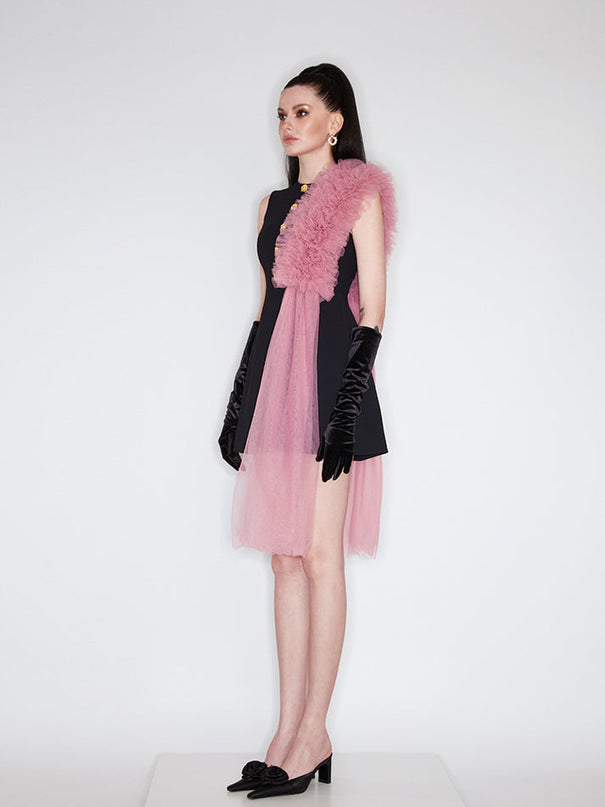 Sophia black dress with a classic A-line silhouette, gold button details, and dramatic pink tulle embellishment, crafted from polyester and nylon.