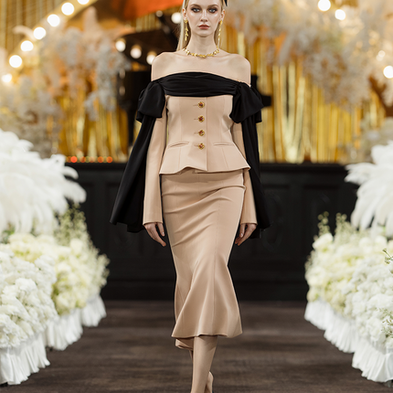 Corset-style top with off-shoulder draped detailing, decorative buttons, and tailored fit. Made from 90% polyester, 10% spandex, and lined with 100% polyester