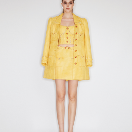 Sophia embellished tweed coat in vibrant yellow with crystal lapels, gemstone buttons, and a fitted mid-thigh silhouette, crafted from 100% polyester.