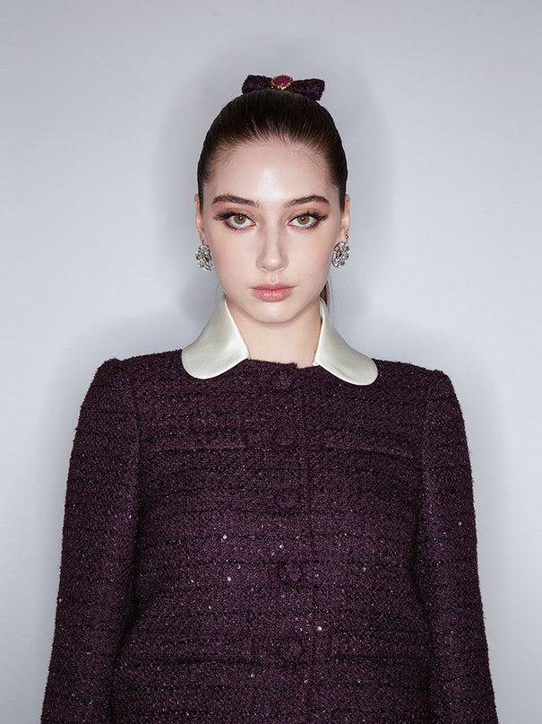 Classic cropped tweed jacket with contrasting collar and cuffs for a refined finish