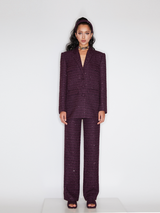 Sophia tweed wide-leg trousers with a high-waisted fit, wide-leg silhouette, and subtle tweed texture, crafted from a premium polyester-wool blend.