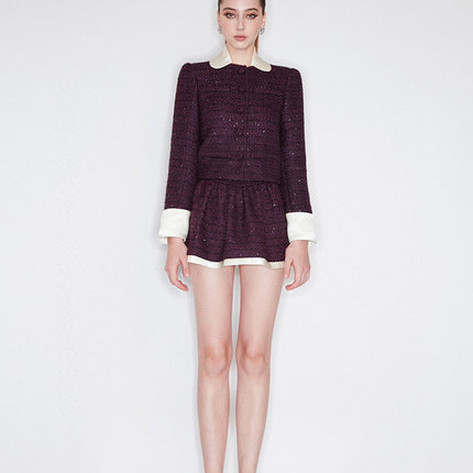 Classic cropped tweed jacket with contrasting collar and cuffs for a refined finish