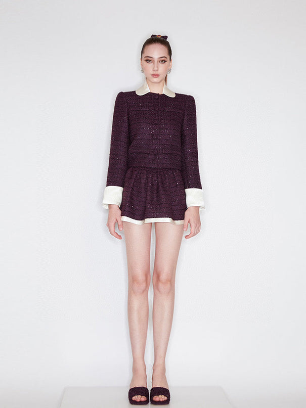 Classic cropped tweed jacket with contrasting collar and cuffs for a refined finish