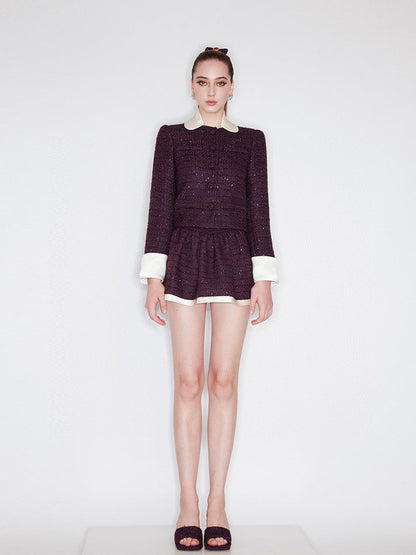 Classic cropped tweed jacket with contrasting collar and cuffs for a refined finish