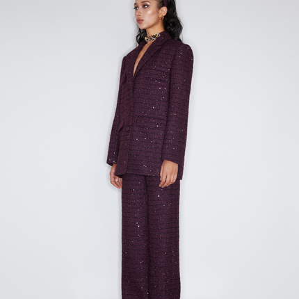 Sophia tweed wide-leg trousers with a high-waisted fit, wide-leg silhouette, and subtle tweed texture, crafted from a premium polyester-wool blend.