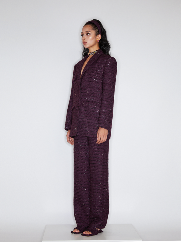 Sophia tweed wide-leg trousers with a high-waisted fit, wide-leg silhouette, and subtle tweed texture, crafted from a premium polyester-wool blend.