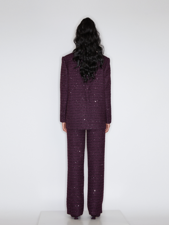 Sophia tweed wide-leg trousers with a high-waisted fit, wide-leg silhouette, and subtle tweed texture, crafted from a premium polyester-wool blend.