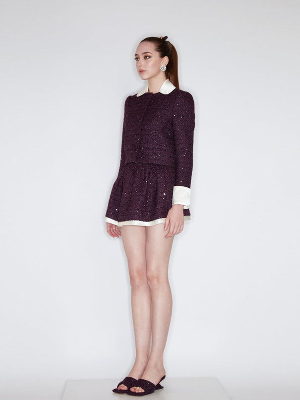 Sophia tweed skater skirt with elastic waistband, layered hem, and subtle sparkle, crafted from a blend of polyester, wool, and mulberry silk.