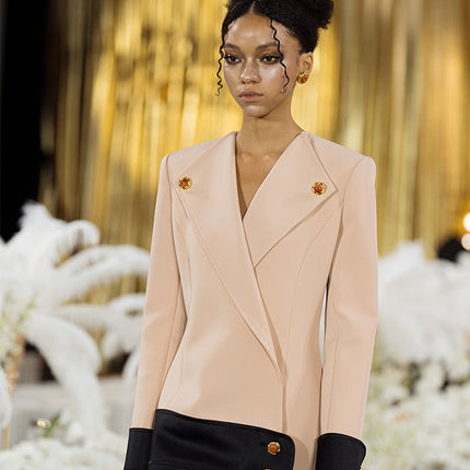 Double-breasted blazer dress with contrast details, decorative buttons, and a tailored fit. Made from 90% polyester, 10% spandex with 96% polyester, 4% spandex accents