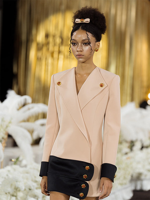 Double-breasted blazer dress with contrast details, decorative buttons, and a tailored fit. Made from 90% polyester, 10% spandex with 96% polyester, 4% spandex accents