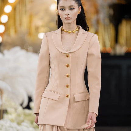 Fitted blazer dress with decorative buttons, tailored silhouette, and flap pockets. Made from 90% polyester, 10% spandex, and lined with 100% polyester