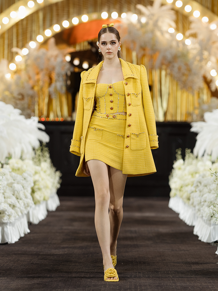 Sophia embellished tweed coat in vibrant yellow with crystal lapels, gemstone buttons, and a fitted mid-thigh silhouette, crafted from 100% polyester.