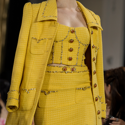 Sophia embellished tweed coat in vibrant yellow with crystal lapels, gemstone buttons, and a fitted mid-thigh silhouette, crafted from 100% polyester.