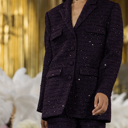 Sophia tweed wide-leg trousers with a high-waisted fit, wide-leg silhouette, and subtle tweed texture, crafted from a premium polyester-wool blend.