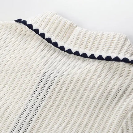 Tessa Van Hoef Contrast-Trim Knit Peplum Top