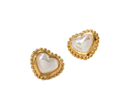 Heart-shaped earrings with gold frames on a white background