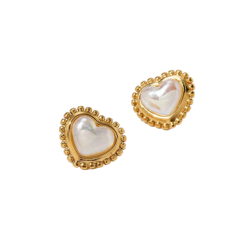 Heart-shaped earrings with gold frames on a white background