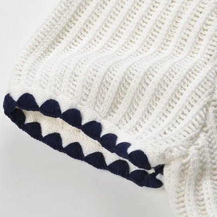 Tessa Van Hoef Contrast-Trim Knit Peplum Top