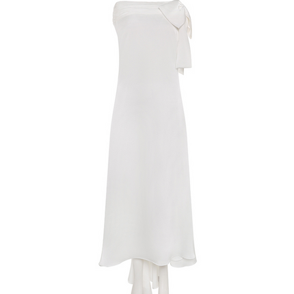 Sophia asymmetric white evening dress with a delicate bow detail, flowing silhouette, and layered hemline, crafted from lightweight polyester.