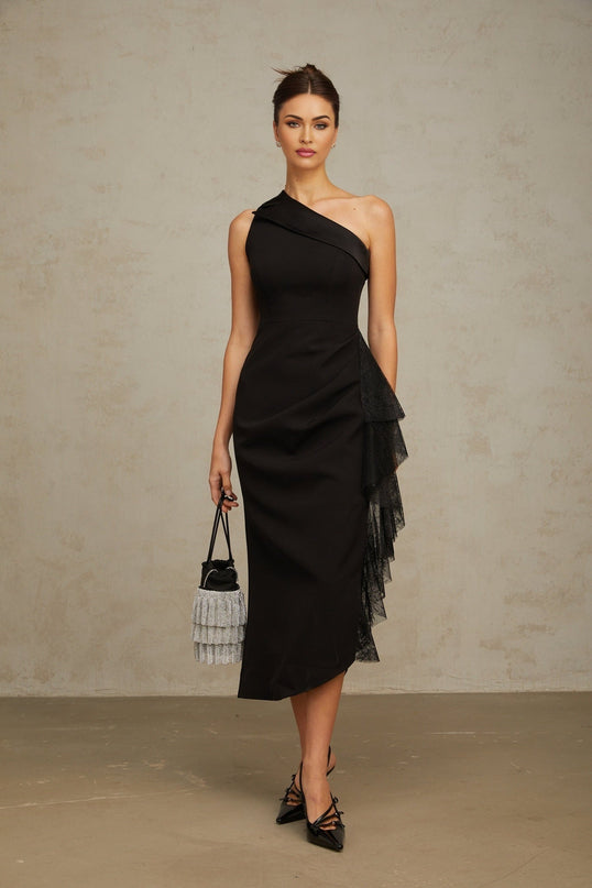 A black asymmetric midi dress with lace panels featuring a fitted bodice and flared skirt