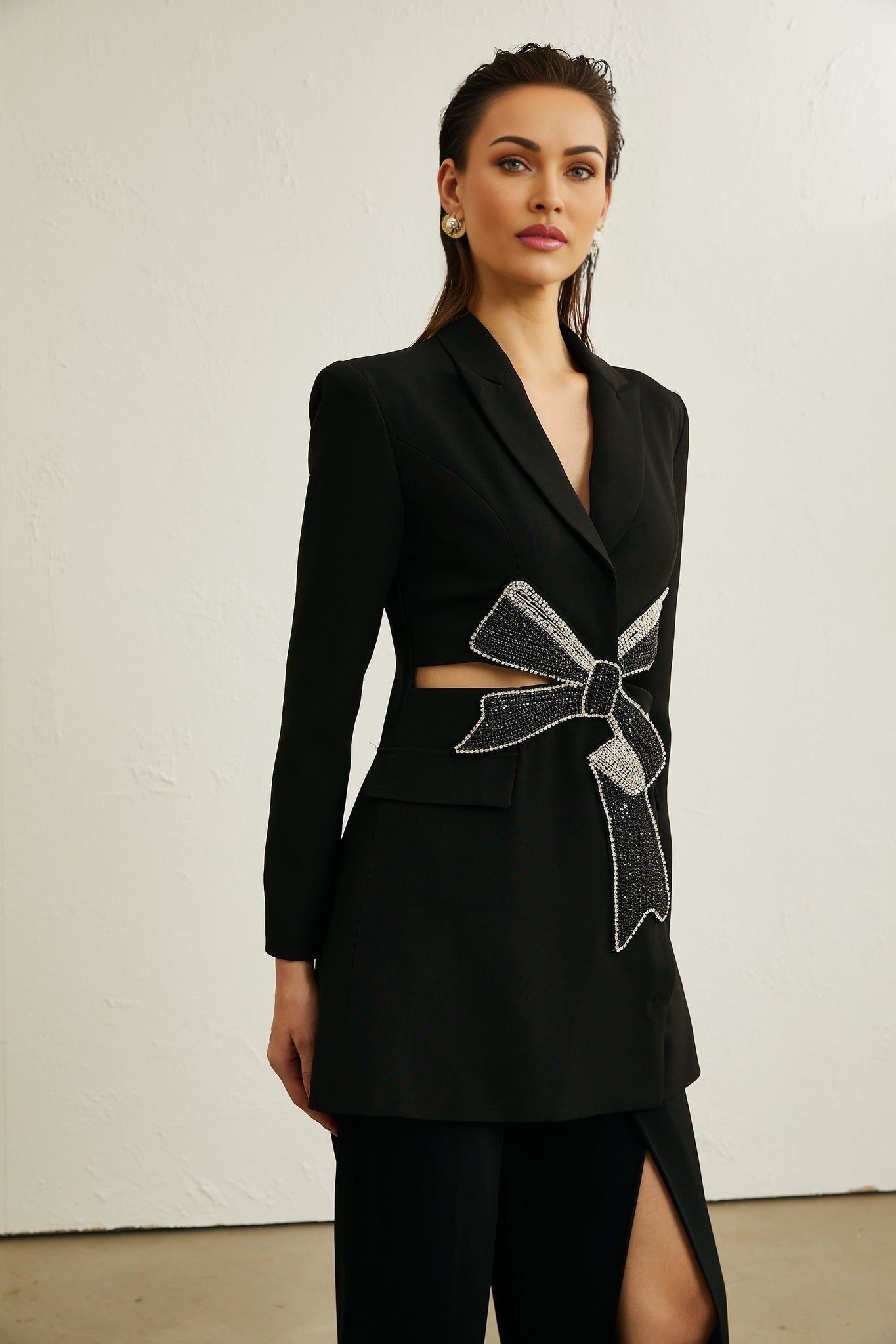 A black blazer with a bowknot detail and cutout design named Justine