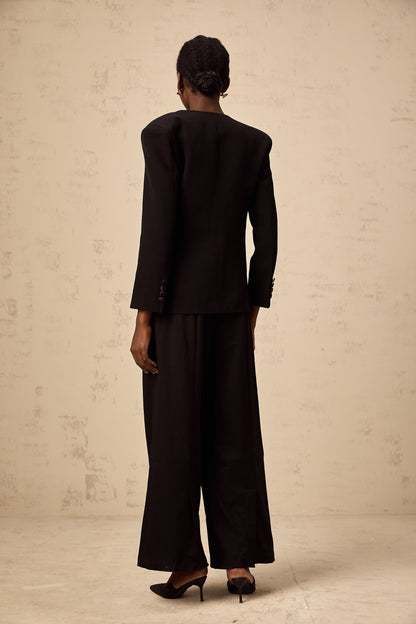 A black blazer with a floral pattern featuring embellished flower motifs named Therese