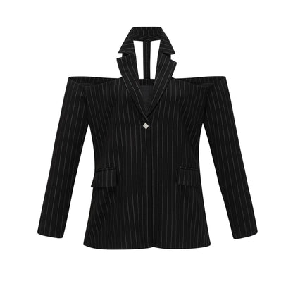 A black blazer with white stripes featuring an open back design worn by a model