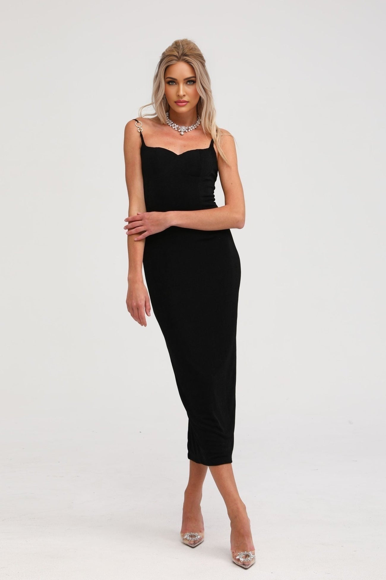 A black bustier style midi dress named Ailbhe on a plain background