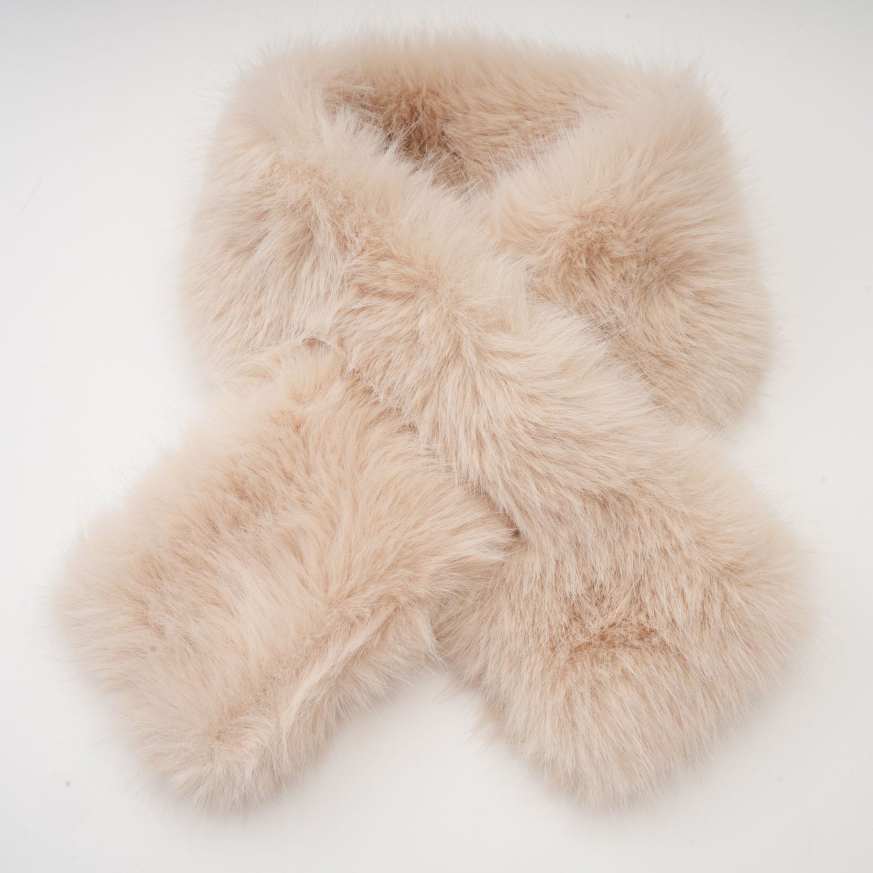 A black coat with a detachable faux fur cape collar featuring a long silhouette and Rosella branding