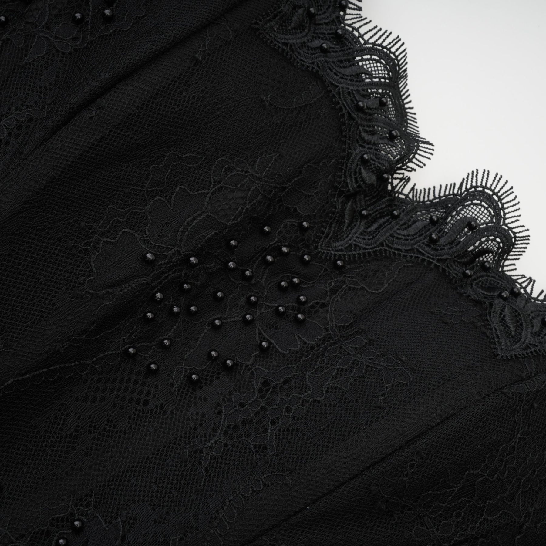 Black offshoulder dress with mesh design lace details fauxpearl embellishments and ribbon accent