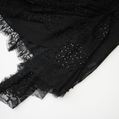 Black offtheshoulder dress with mesh lace pearl accents and ribbon detail mini length