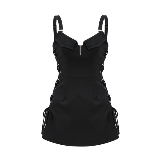 Black sleeveless Vneck dress with a structured boned bodice adjustable shoulder straps and chest flap pockets Chic thighlength coverage composed of 98% Organic Cotton and 2% Elastane