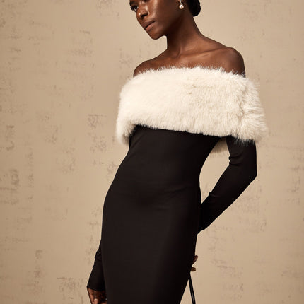 A black faux fur midi dress with an offshoulder neckline featuring a sleek silhouette and plush texture