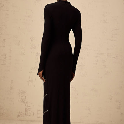 A black fitted maxi dress with zipper details named Costanza