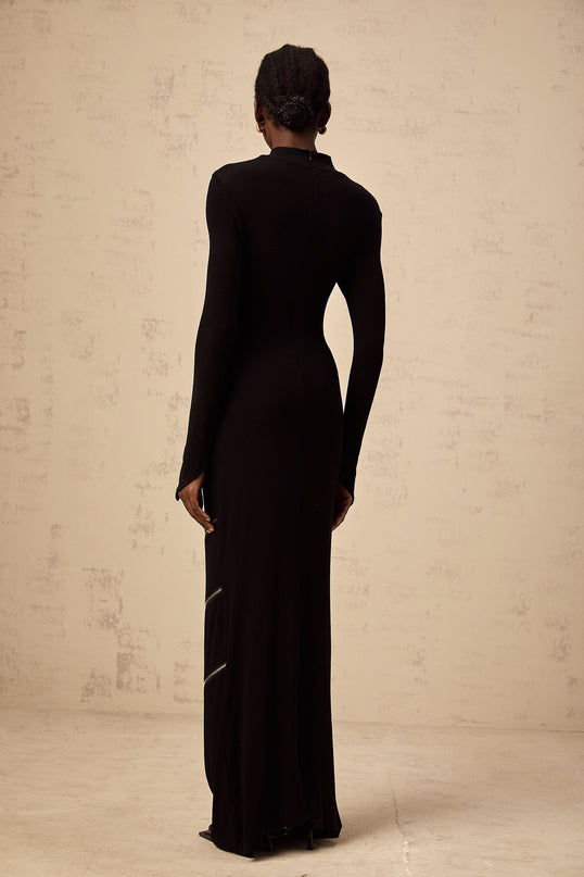 A black fitted maxi dress with zipper details named Costanza